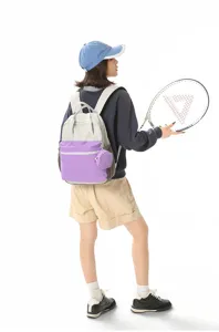 Grand sac à dos décontracté au design color-block élégant, parfait pour les voyages et l'école.
