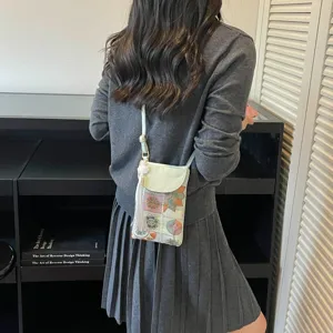 New Chinese style embroidered mini crossbody phone bag with tassel, ethnic style.