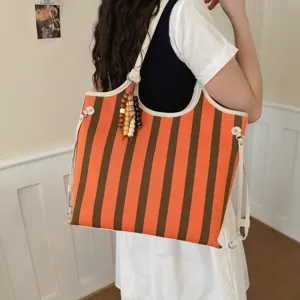 Borsa shopper a righe alla moda da donna, grande borsa a tracolla per lavoro e tempo libero.