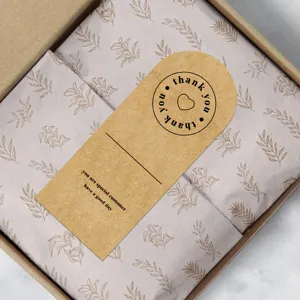 Kraft paper thank you sticker label detail view for gift packaging and box sealing use.