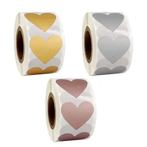 Herzförmige Rollenaufkleber Details, metallic gold silber und rosa Klebeetikett Nahansicht