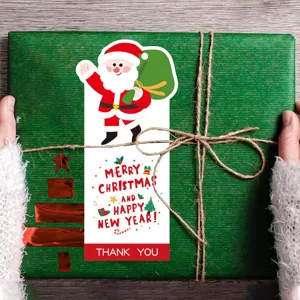 Adhesivo navideño con forma de dibujos animados para sellar cajas de regalo y decoración.
