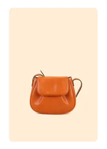 Stylish caramel leather saddle bag for women, classic crossbody shoulder design for daily use.