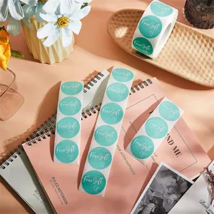 Round green self-adhesive thank you stickers roll for packaging and gift decoration.