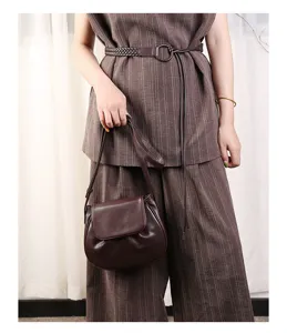 Brown leather shoulder saddle bag, stylish crossbody shell bag for women daily wear.
