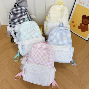 Sweet style plaid backpack detail view, featuring cute lace trim and heart patch design.
