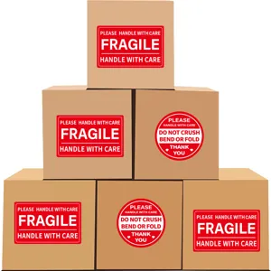 Etichette adesive di avvertimento fragile per spedizione e imballaggio con molta cura.
