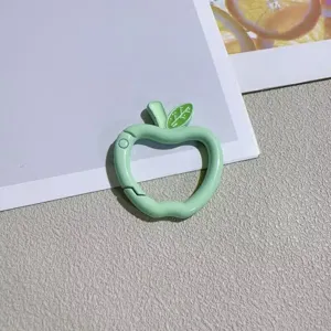 Light green apple shaped spring snap hook keychain DIY jewelry accessory detail view