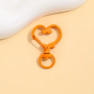 Orange heart shaped lobster clasp metal spring hook for DIY jewelry making accessories detail shot