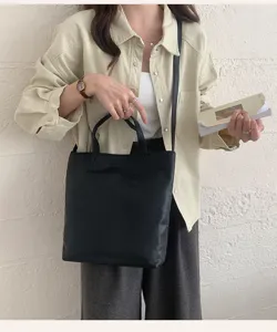 Korean minimalist black tote bag, large capacity shoulder handbag for women daily commute.