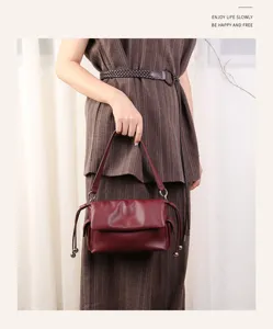 Stylish leather pleated underarm shoulder bag for women, casual cloud drawstring handbag.