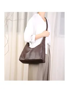 Brown leather slouchy hobo shoulder bag for women, large capacity daily commuter handbag.
