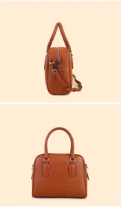 Brown leather Boston bag detail view, casual commute handbag with adjustable strap and zip.