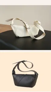 Close-up detail of stylish leather dumpling shoulder bag, showing fine texture and adjustable strap.