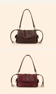 Pleated leather shoulder bag with chic side drawstrings, stylish cloud handbag for women.