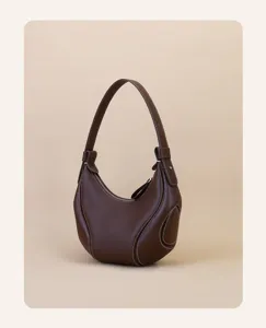 Dark brown leather underarm bag for women, stylish crescent shoulder bag for daily commute.