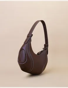 Dark brown leather crescent shoulder bag, stylish casual underarm commuting purse for women.