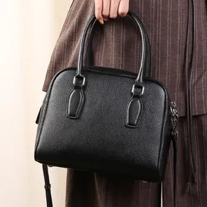 Black leather Boston handbag for women, casual commuting top handle shoulder messenger bag.
