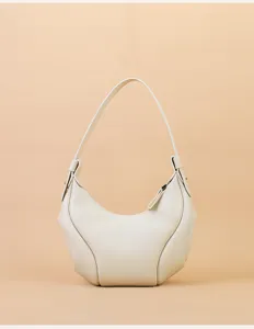 Minimalist genuine leather crescent shoulder bag for women, trendy chic underarm hobo purse.