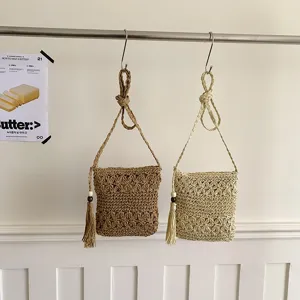 Bolso cruzado de paja tejida bandolera casual con colgante de borla para la playa de verano