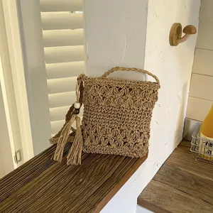Bolso de hombro tejido casual de moda, bolso cubo minimalista ligero de paja.