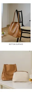 Detail view showing bottom surface and hanging style of the retro soft cowhide leather tote bag.