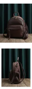 Detailed view of vintage genuine leather backpack, showcasing fine texture and metal zippers.