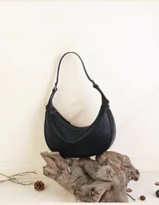 Black genuine leather crescent hobo bag retro minimalist underarm shoulder bag detail shot