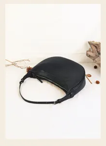 Black genuine leather crescent hobo bag, vintage casual shoulder underarm bag detail.