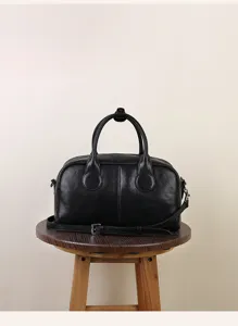 Black leather Boston bag detail, vintage retro crossbody handbag for women everyday.