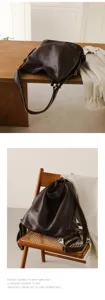 Genuine leather shoulder bag casual versatile backpack for women stylish brown daily wear.
