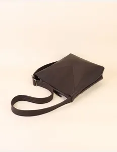 Dark brown genuine leather shoulder bag detail, minimalist soft commuter crossbody.