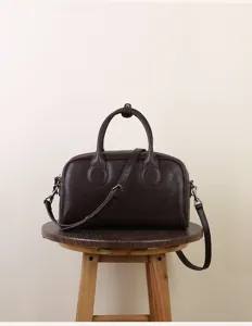 Vintage brown Boston handbag for women, retro crossbody pillow bag, stylish autumn winter purse.