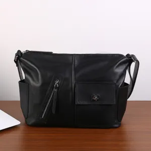 Black genuine leather shoulder bag for men and women, stylish minimalist crossbody bag.