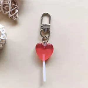 Portachiavi lecca-lecca a cuore rosso, grazioso ciondolo caramella in resina, accessorio borsa.