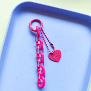 Handmade jelly acrylic heart keychain strap, cute charm for phone case and handbag accessory.