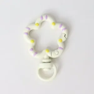 Cute floral spring snap hook keyring DIY charm accessory with painted details and metal ring.