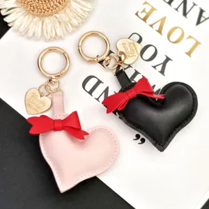 Cute leather heart keychain with red bow gold hardware car bag pendant charm accessory