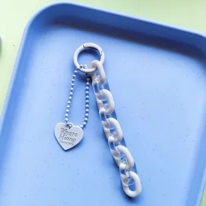 Detailed view of handmade jelly color acrylic heart keychain bag pendant strap charm accessory.