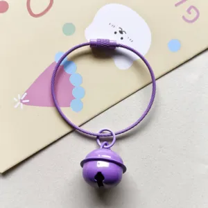 Purple painted metal bell keychain with steel wire ring, cute bag pendant and small gift accessory.