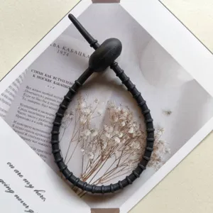 Zwarte siliconen kikkervisje kabelwinder riem DIY sleutelhanger tas hangende accessoire.
