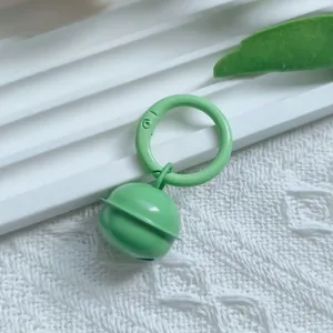 Green metal bell pendant keychain with spring snap hook for diy bag charm ornament accessory