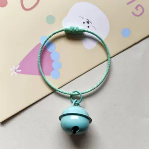 Mint green metal bell keychain with steel wire loop, cute bag pendant and key ring accessory.