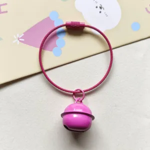 Pink coated wire keychain with matching metal bell pendant, cute bag charm and gift accessory.