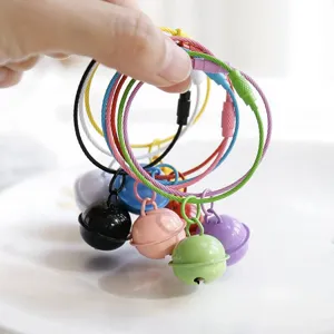 Colorful metal wire keyrings with cute painted bells, perfect bag charms and key chains.