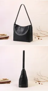 Detail view of black soft leather shoulder bag showcasing minimalist hobo design and fine texture.