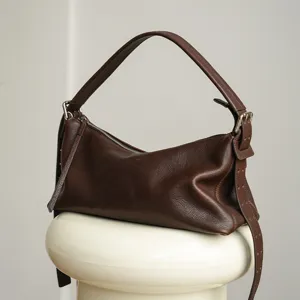Retro genuine leather hobo shoulder bag for women, stylish underarm pillow handbag.