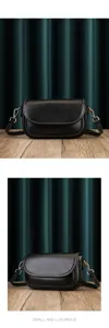 Black leather crossbody bag with soft compartment, chic shoulder strap and neat stitching.