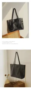 Black genuine leather tote bag for women, large capacity soft cowhide commuter shoulder bag.