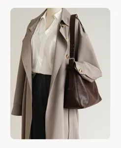 Stylish brown leather shoulder bag, vintage underarm bag for women, premium design.